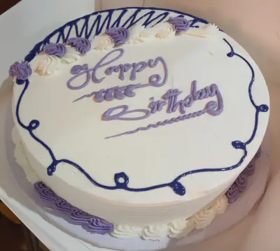 10" x 3" vanilla buttercream cake from PRINCESS  CAKES AND  CONFECTIONERIES