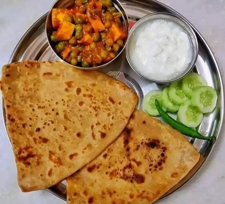 Mutter Paneer, Triangle Paratha, Raita & Salad